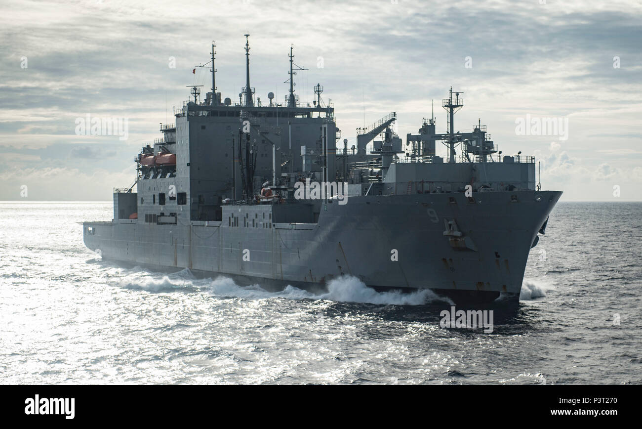 160730-N-QW941-001 AT SEA (July 30, 2016) Dry cargo ship USNS Matthew Perry (T-AKE 9), prepares to come alongside hospital ship USNS Mercy (T-AH 19) for a replenishment-at-sea. Mercy, which is deployed in support of Pacific Partnership 2016, is en route to its fourth mission stop in Kuantan, Malaysia. Upon arrival, partner nations will work side-by-side with local military and non-government organizations to conduct cooperative health engagements, community relation events and subject matter expert exchanges to better prepare for a natural disaster or crisis.(U.S. Navy photo by Mass Communicat Stock Photo