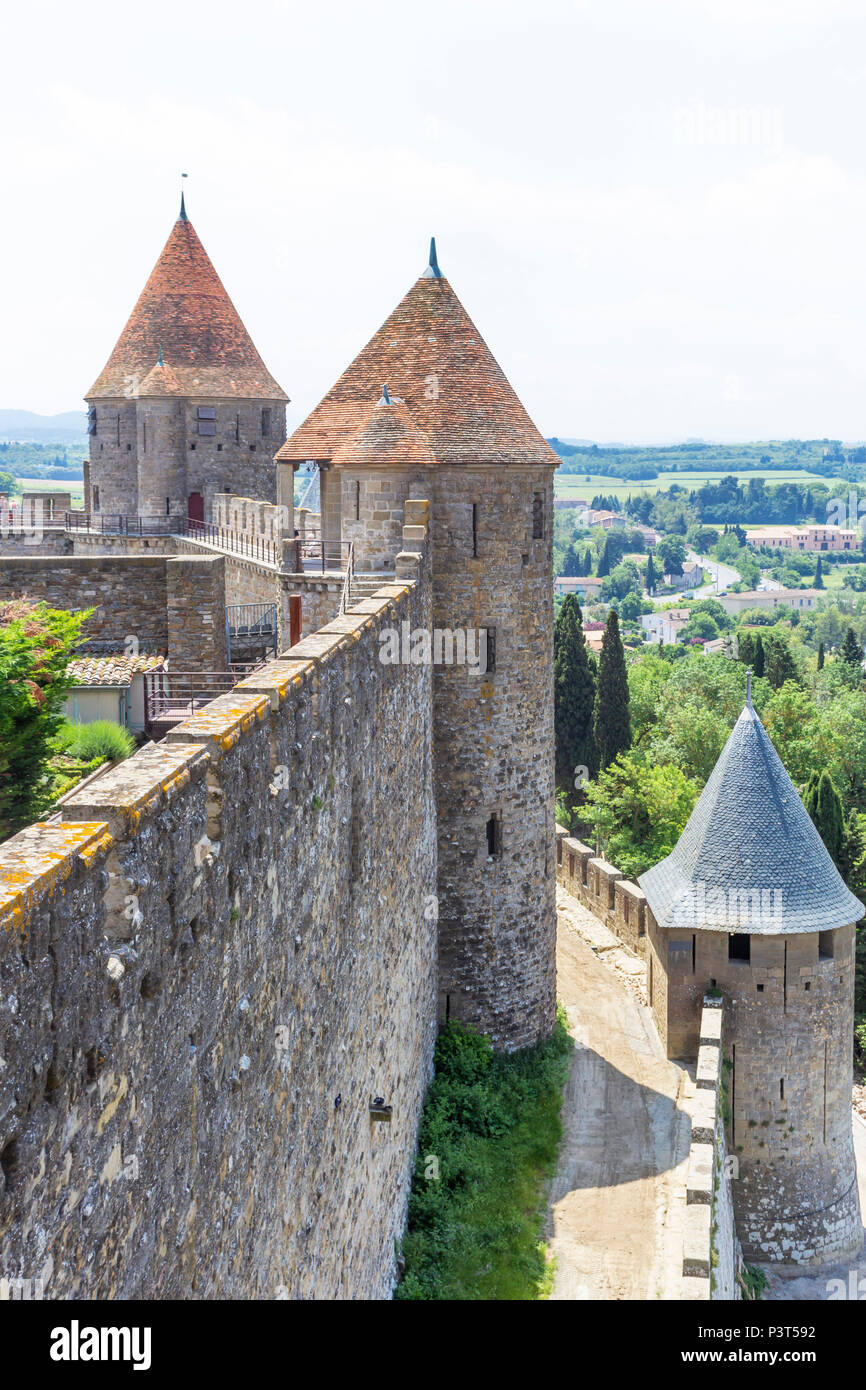 The medieval Cité of Carcassonne, French department of Aude, Occitanie Region, France. Outer walls, ramparts, turrets and towers. Stock Photo