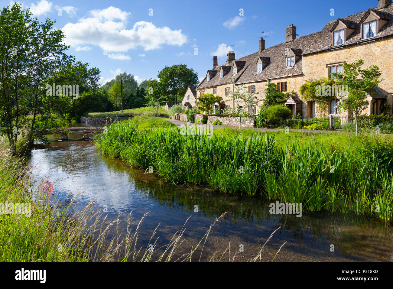 Cotswold stone cottages beside the River Eye, Lower Slaughter, The Cotswolds, Gloucestershire, England, United Kingdom, Europe Stock Photo