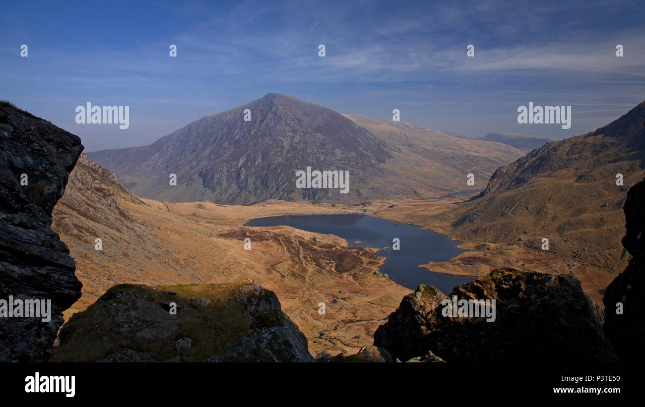 Pen yr Ole Wen mountain and Llyn Idwal lake, Snowdonia, North Wales viewed from the Devil's Kitchen on a sunny summer's day Stock Photo