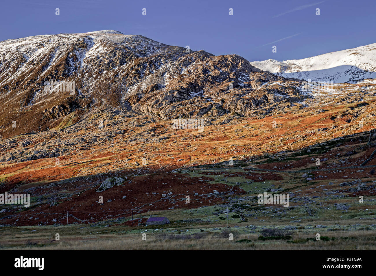 Carneddau mountains with snow under winter sun, Snowdonia, North Wales Stock Photo