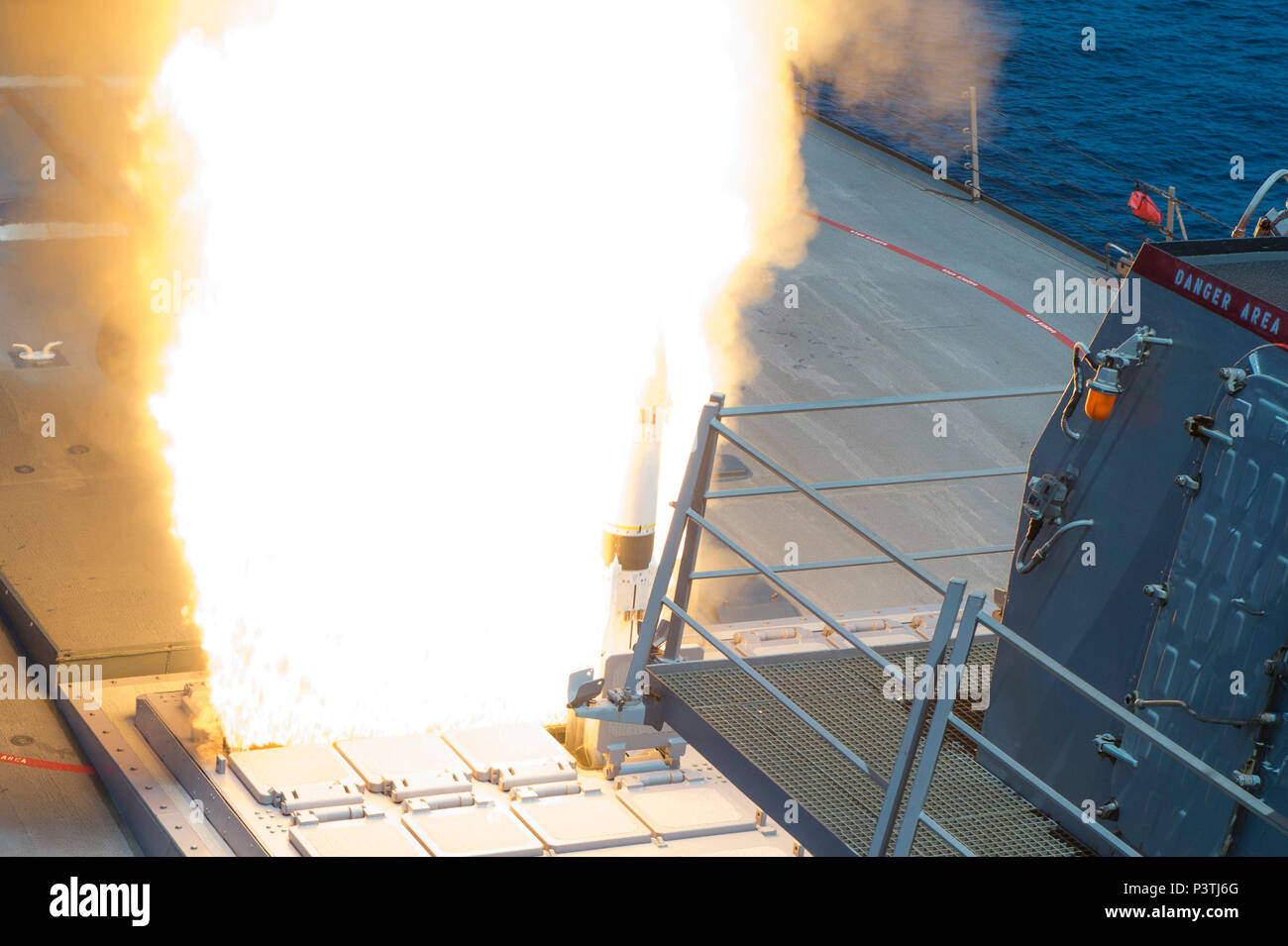 160721-N-BY095-197 ATLANTIC OCEAN (July 21, 2016) USS Arleigh Burke (DDG 51) successfully launches an SM-2 Standard Missile from the forward Vertical Launching System as part of their Combat System Ship Qualification Trials (CSSQT). The Spanish Navy Ship Cristobol Colon (F-105) and Arleigh Burke are conducting cooperative air defense test exercises including Tactical Data Link interoperability tests of the latest AEGIS Baseline 9.C1 with a foreign ship, as well as the first combined Combat Systems Ship Qualification Trial with the Spanish Navy since 2007. These types of cooperative events with Stock Photo