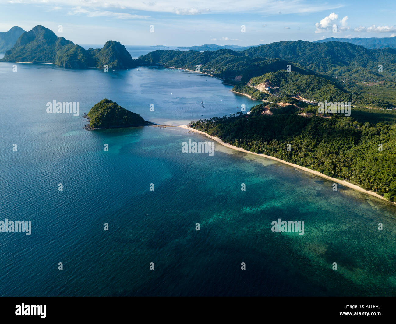 Aerial drone view of a tropical ocean with towering limestone islands (El Nido, Palawan) Stock Photo