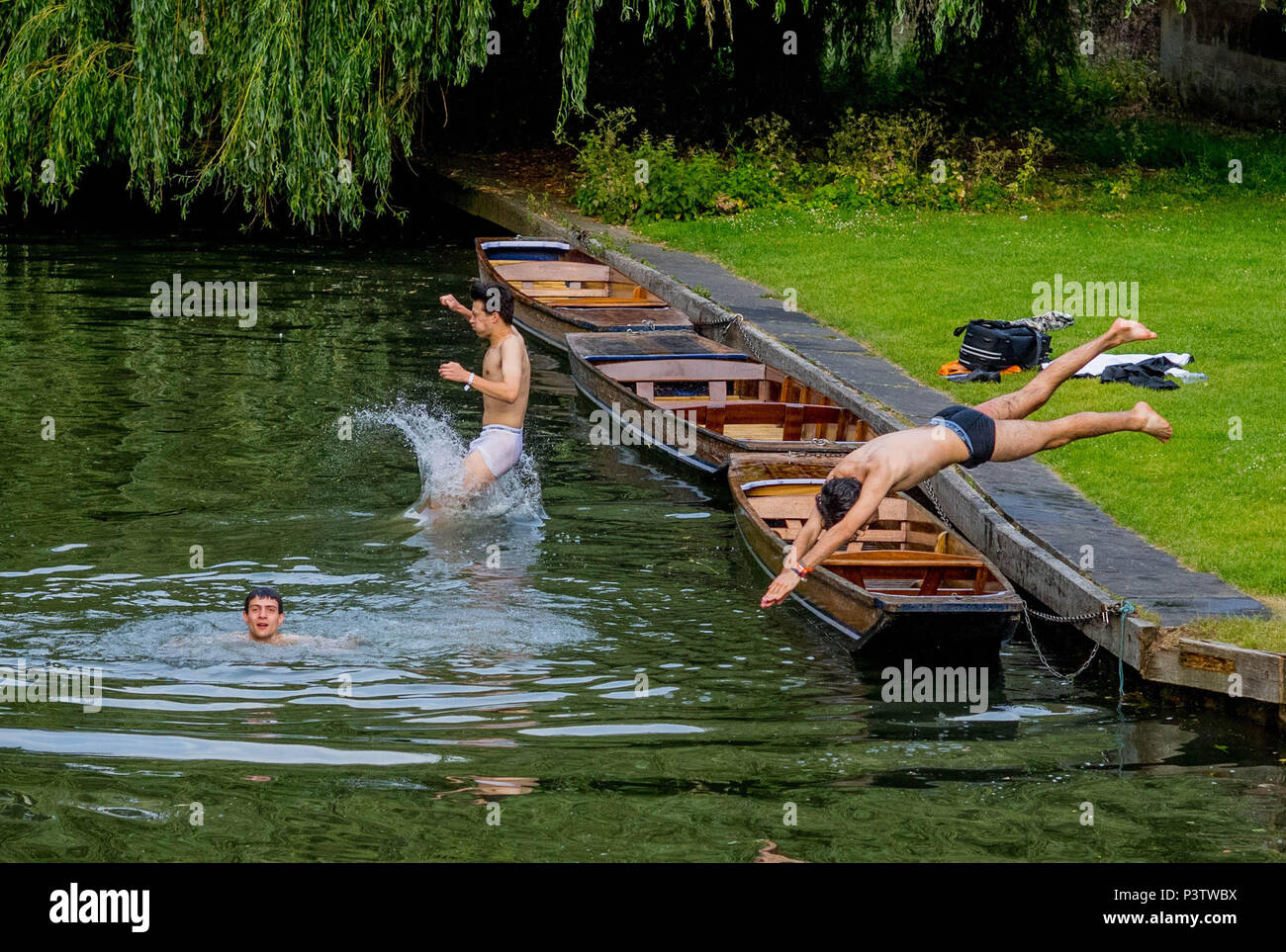 Cambridge, UK. 19th June, 2018. Trinity College Cambridge May Ball. Cambridge University students swim in the River Cam along the backs of Cambridge after attending the Trinity College May Ball..  Picture by Andrew Parsons / Parsons Media Credit: andrew parsons/Alamy Live News Stock Photo