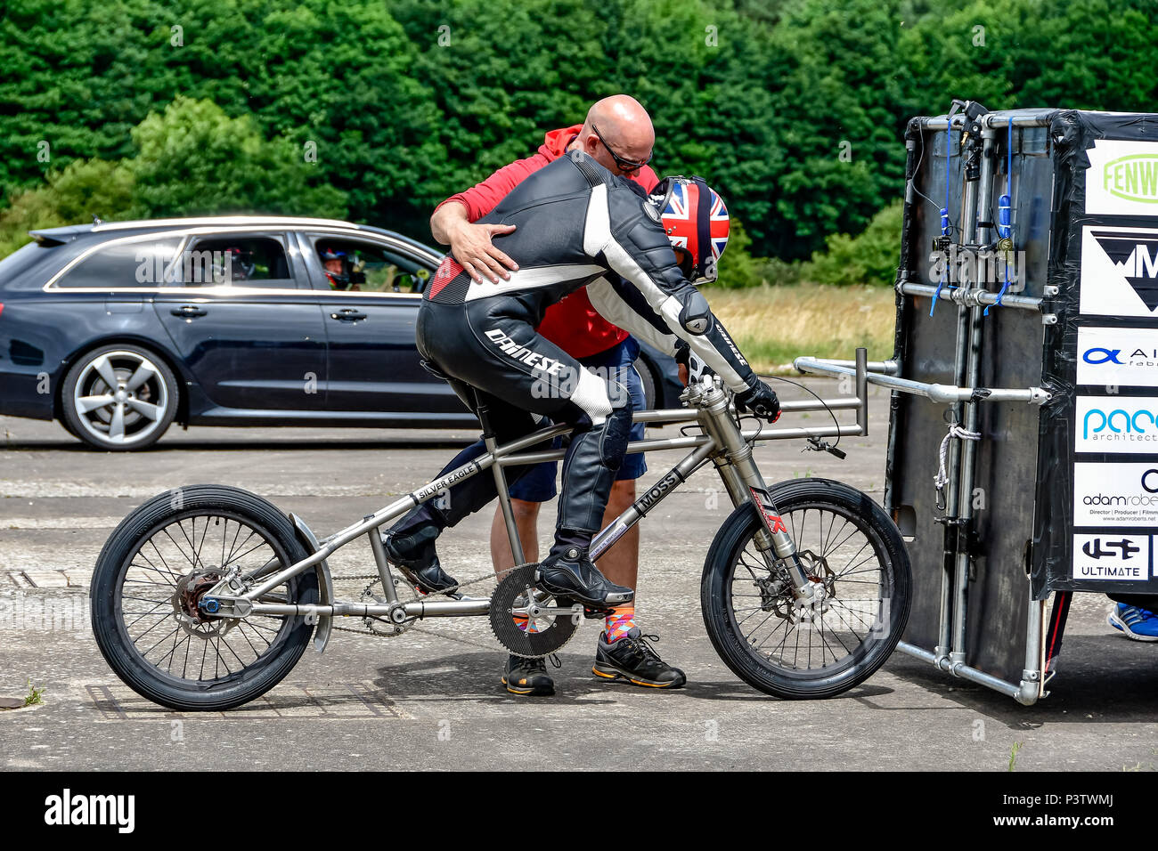 Elvington Airfield, Yorkshire, UK. 19th Jun, 2018. Neil Campbell sets European top speed record on self propelled bicycle riding at 135.3mph at Elvington Straightliners top speed event 19th June 2018 Credit: Mark Burn/Alamy Live News Stock Photo