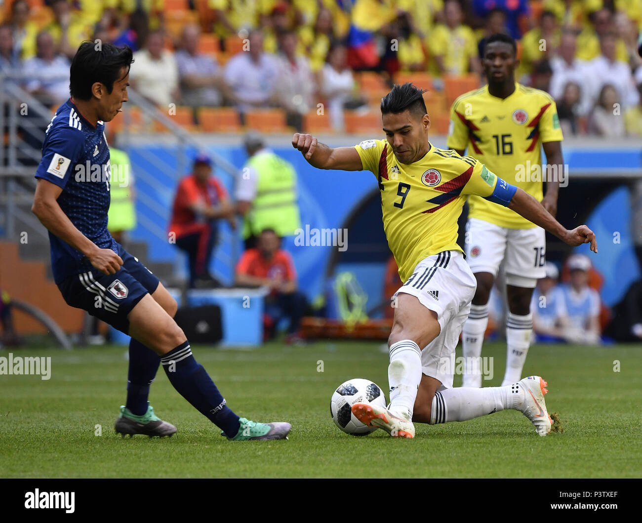Saransk, Russia. 19th June, 2018. Radamel Falcao (R front) of Colombia competes during a Group H match between Colombia and Japan at the 2018 FIFA World Cup in Saransk, Russia, June 19, 2018. Credit: He Canling/Xinhua/Alamy Live News Stock Photo