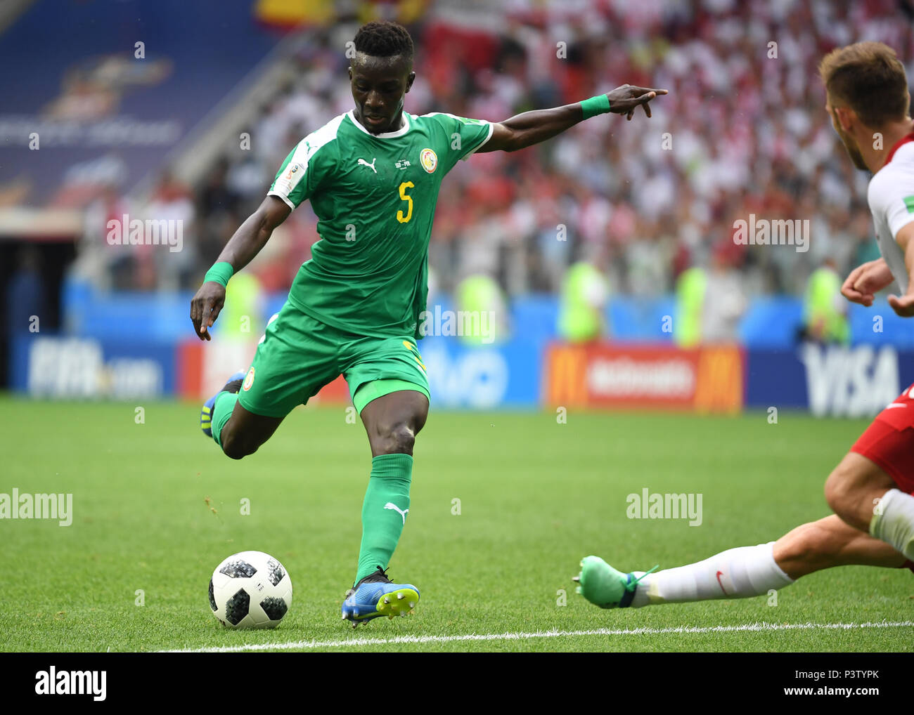 Moscow, Russia. 19th June, 2018. Soccer: World Cup 2018, group stages, group H: Poland vs Senegal at Spartak Stadium. Senegal's Idrissa Gueye shoots at the goal. Credit: Federico Gambarini/dpa/Alamy Live News Stock Photo