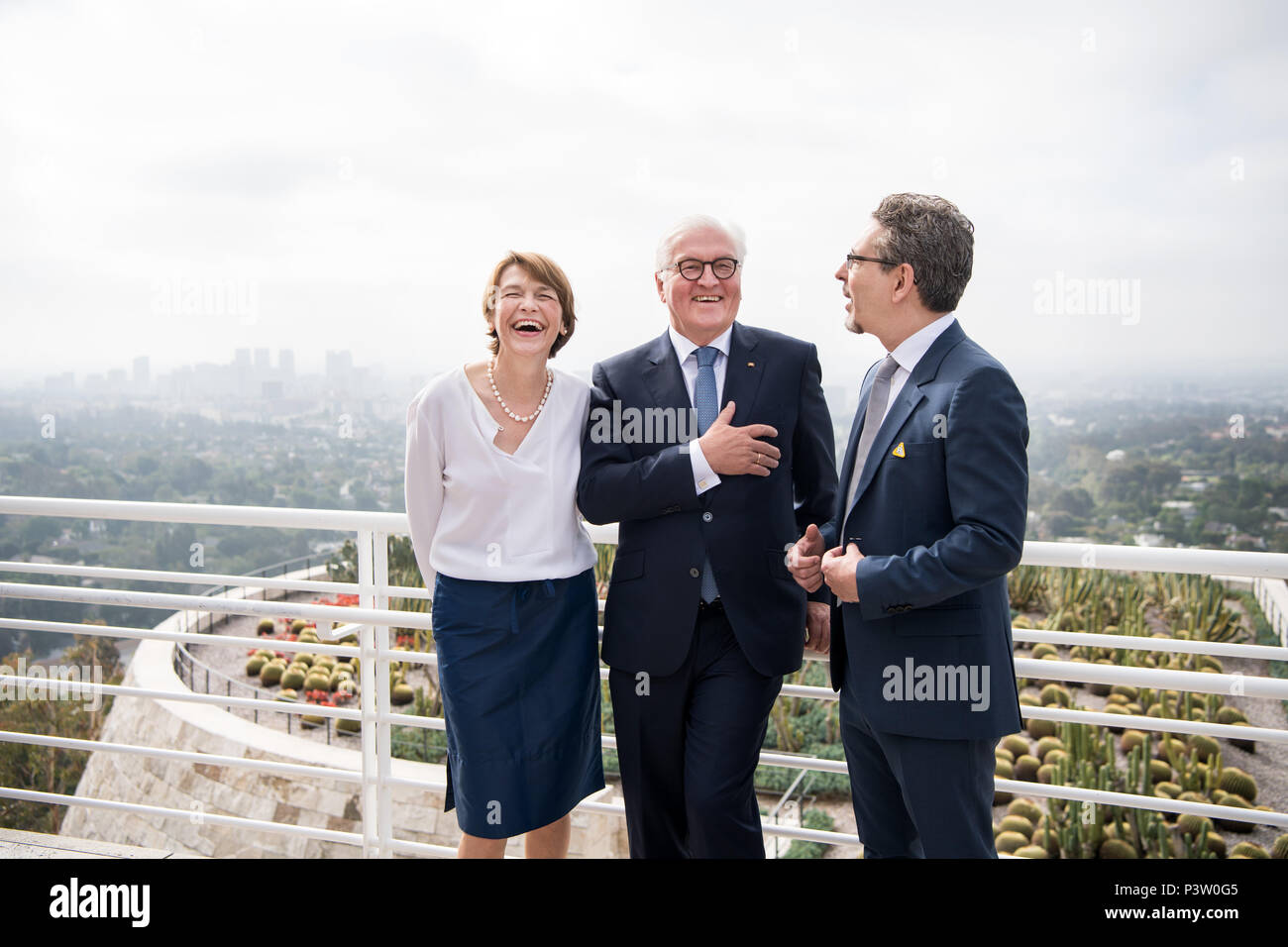 19 June 2018, USA, Los Angeles (California): German President Frank-Walter Steinmeier (C) and his wife Elke Buedenbender, are guided through the complex and the garden of the Getty Museum by the deputy director of the Getty Research Institute, Andrew Perchuk (R). President Steinmeier and his wife are on a three day visit to California. Photo: Bernd von Jutrczenka/dpa Stock Photo