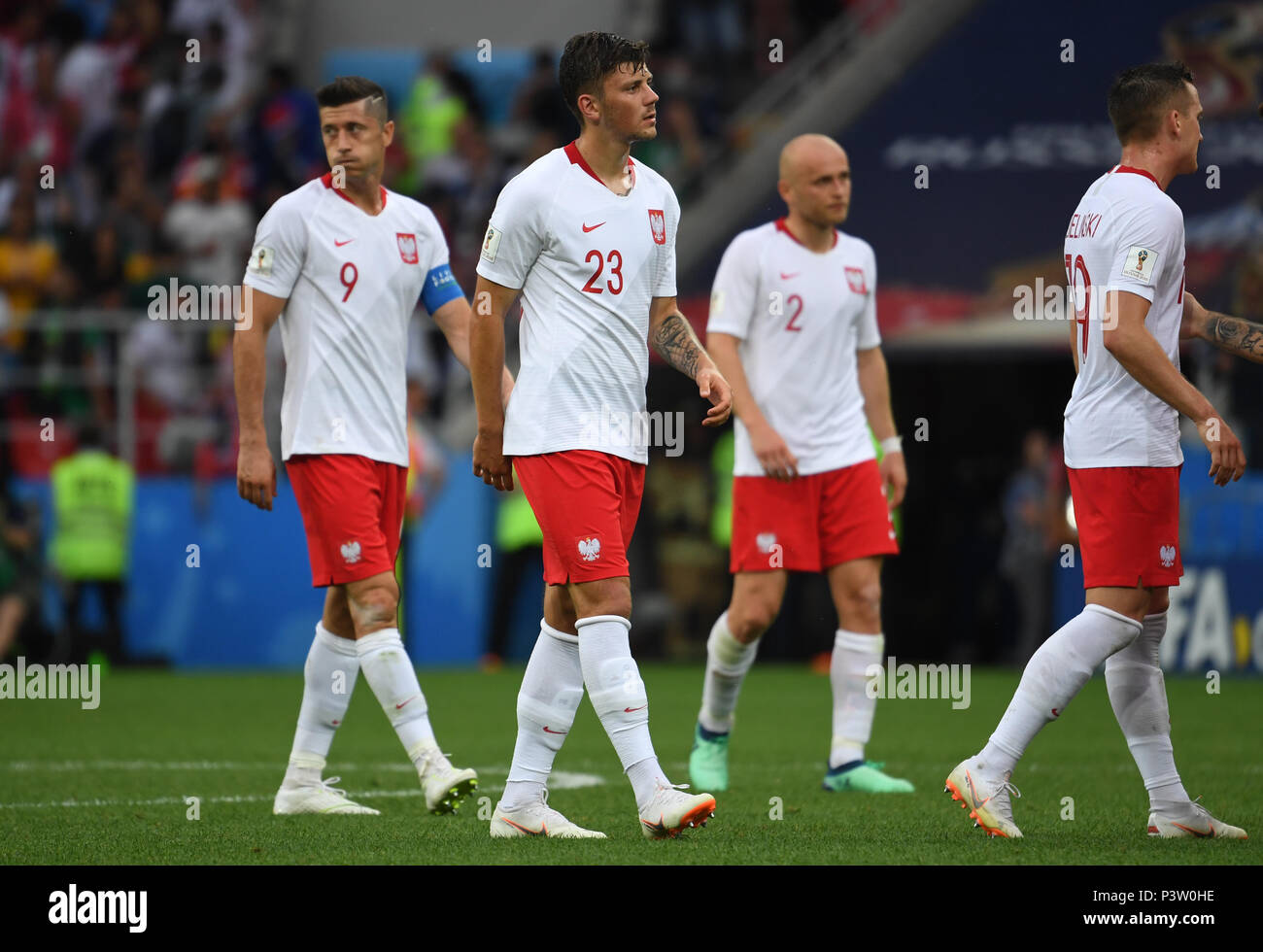 Moscow, Russia. 19th June, 2018. Soccer: World Cup 2018, group stages, group H: Poland vs Senegal at Spartak Stadium. Poland's Robert Lewandowski (L-R), Dawid Kownacki, Michal Pazdan leave the field looking disappointed after the match. Credit: Federico Gambarini/dpa/Alamy Live News Stock Photo