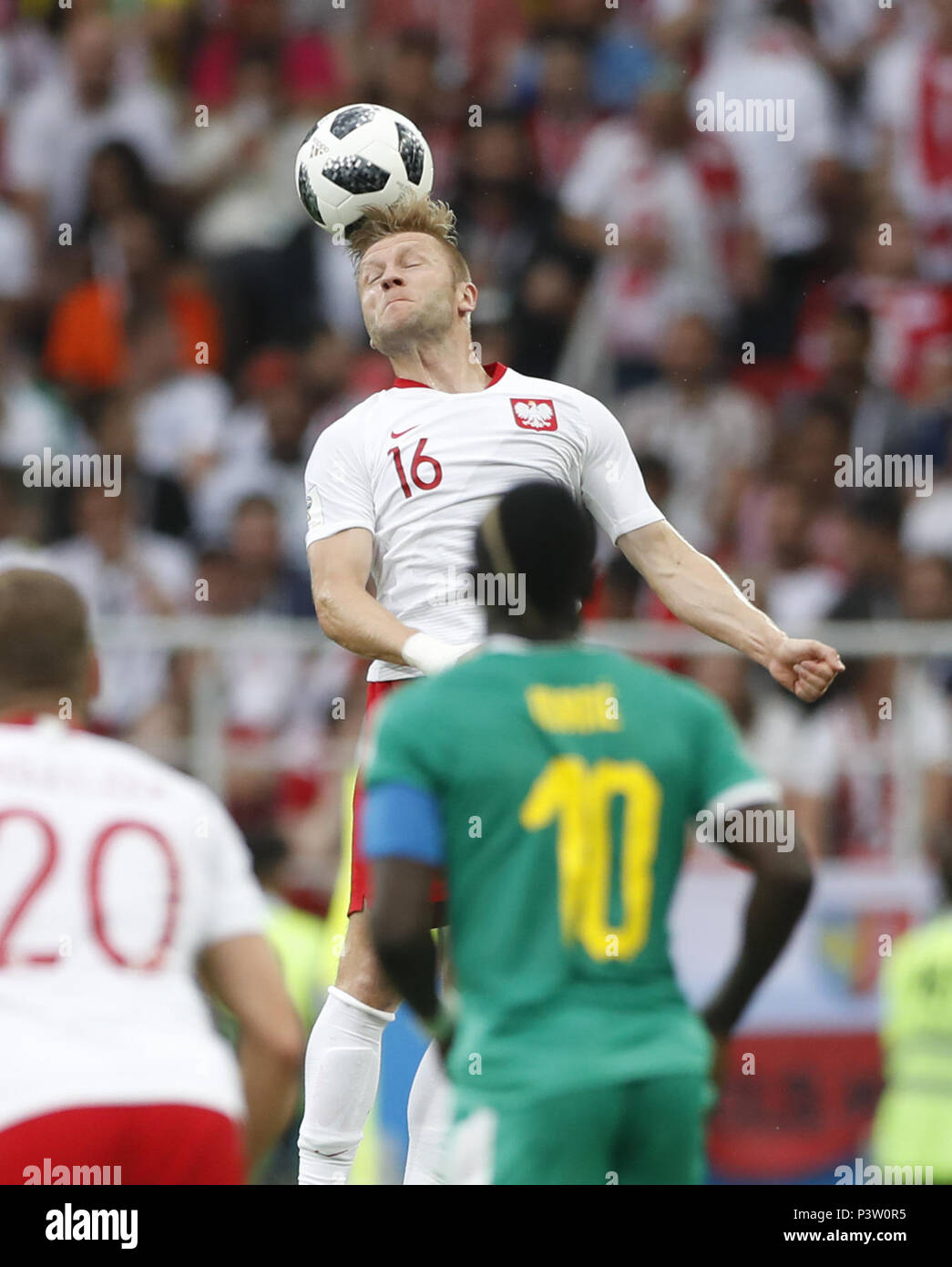 Moscow, Russia. 19th June, 2018. Jakub Blaszczykowski (top) of Poland competes during a Group H match between Poland and Senegal at the 2018 FIFA World Cup in Moscow, Russia, June 19, 2018. Credit: Cao Can/Xinhua/Alamy Live News Stock Photo