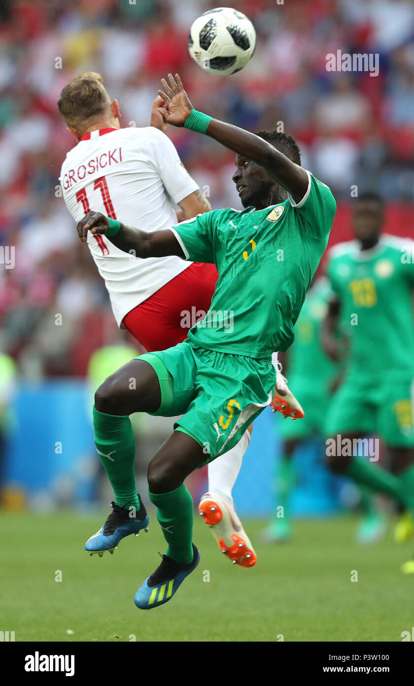 Moscow, Russia. 19th June, 2018. Idrissa Gana Gueye (R) of Senegal vies with Kamil Grosicki of Poland during a Group H match between Poland and Senegal at the 2018 FIFA World Cup in Moscow, Russia, June 19, 2018. Credit: Ye Pingfan/Xinhua/Alamy Live News Stock Photo