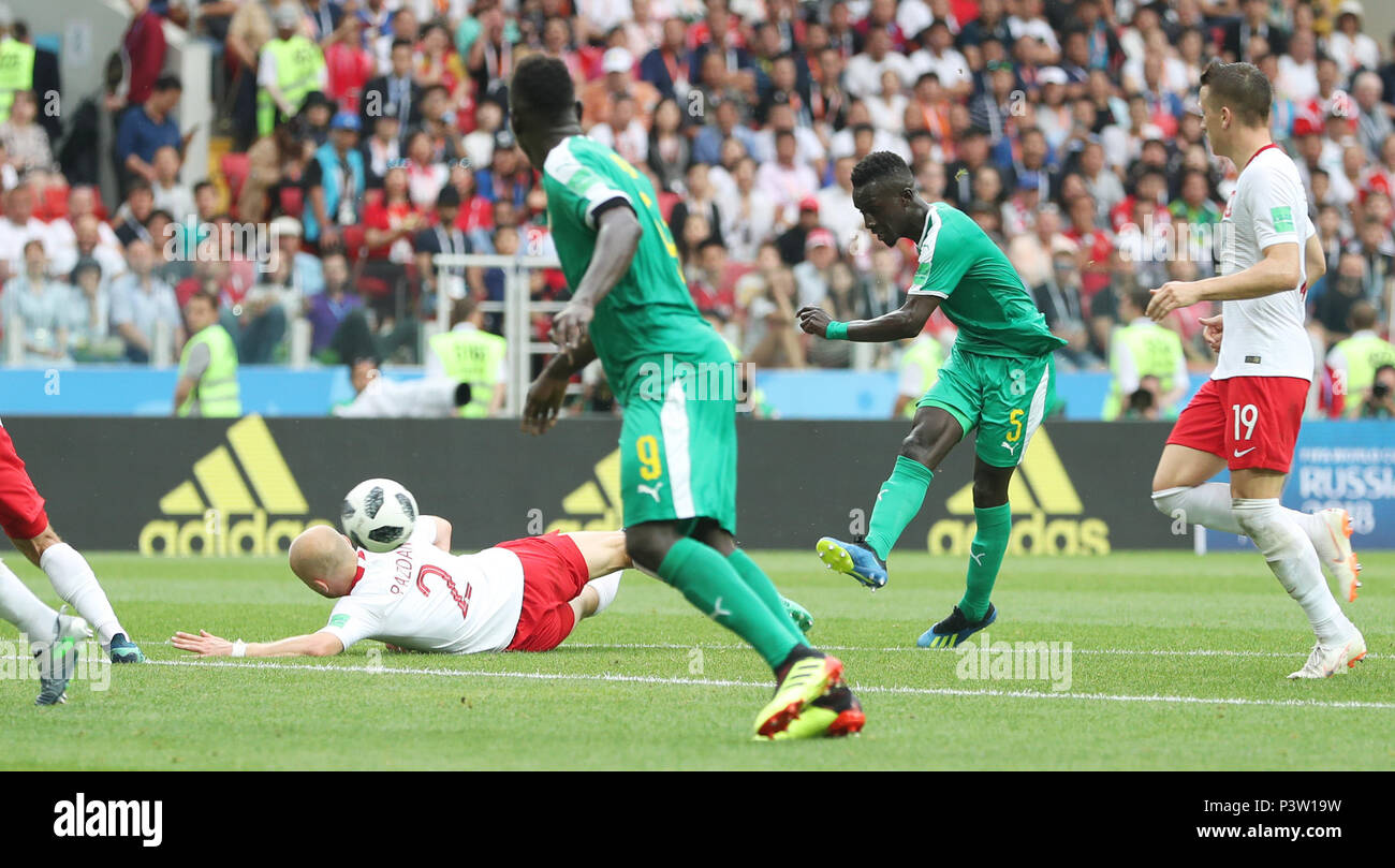 Moscow, Russia. 19th June, 2018. Idrissa Gana Gueye (2nd R) of Senegal shoots during a Group H match between Poland and Senegal at the 2018 FIFA World Cup in Moscow, Russia, June 19, 2018. Credit: Cao Can/Xinhua/Alamy Live News Stock Photo