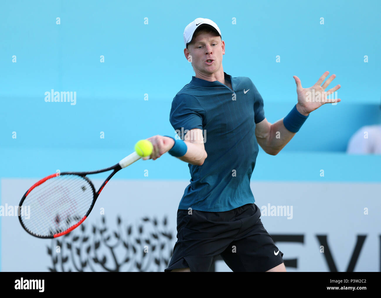 Queens Club, London, UK. 19th June, 2018. The Fever Tree Tennis  Championships; Kyle Edmund (GBR) with a forehand volley Credit: Action Plus  Sports/Alamy Live News Stock Photo - Alamy
