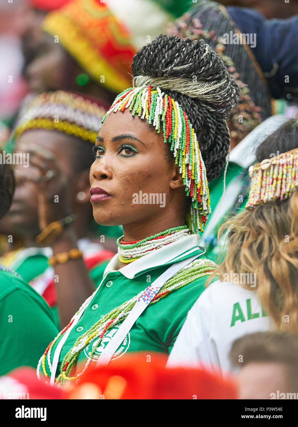 Moscow, Russia. 19th Jun, 2018. Poland- Senegal, Soccer, Moscow, June 19, 2018 Senegalese woman in traditional dress, fans, supporters, spectators, club flags,  celebration.  POLAND - SENEGAL 1-2 Football FIFA WORLD CUP 2018 RUSSIA, Season 2018/2019,  June 19, 2018 S p a r t a k Stadium in Moscow, Russia.  © Peter Schatz / Alamy Live News Stock Photo