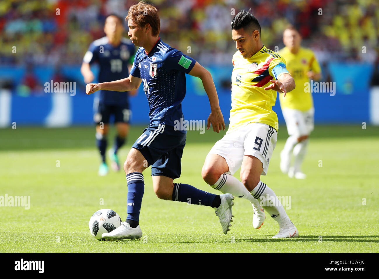 Saransk, Russia. 19th June, 2018. (L-R) Takashi Inui (JPN), Radamel Falcao (COL) Football/Soccer : FIFA World Cup Russia 2018 Group H match between Colombia 1-2 Japan at Mordovia Arena, in Saransk, Russia . Credit: Yohei Osada/AFLO SPORT/Alamy Live News Stock Photo