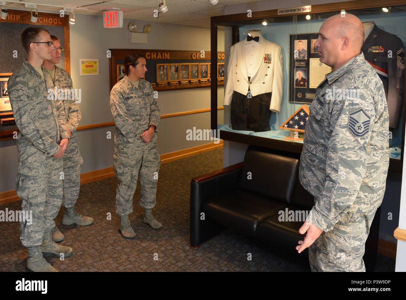 Master Sgt. Jeremy Woods, Airman Leadership School commandant, speaks about the Air Force rank structure to United States Air Force Academy cadets during an immersion tour at Barksdale Air Force Base, La., July 12, 2016. After completion of two years of education at the academy, cadets are sent to bases across the world to experience the operational Air Force firsthand and aid in deciding whether they will continue their Air Force training and also help prioritize their career field options. (U.S. Air Force photo/Senior Airman Curt Beach) Stock Photo