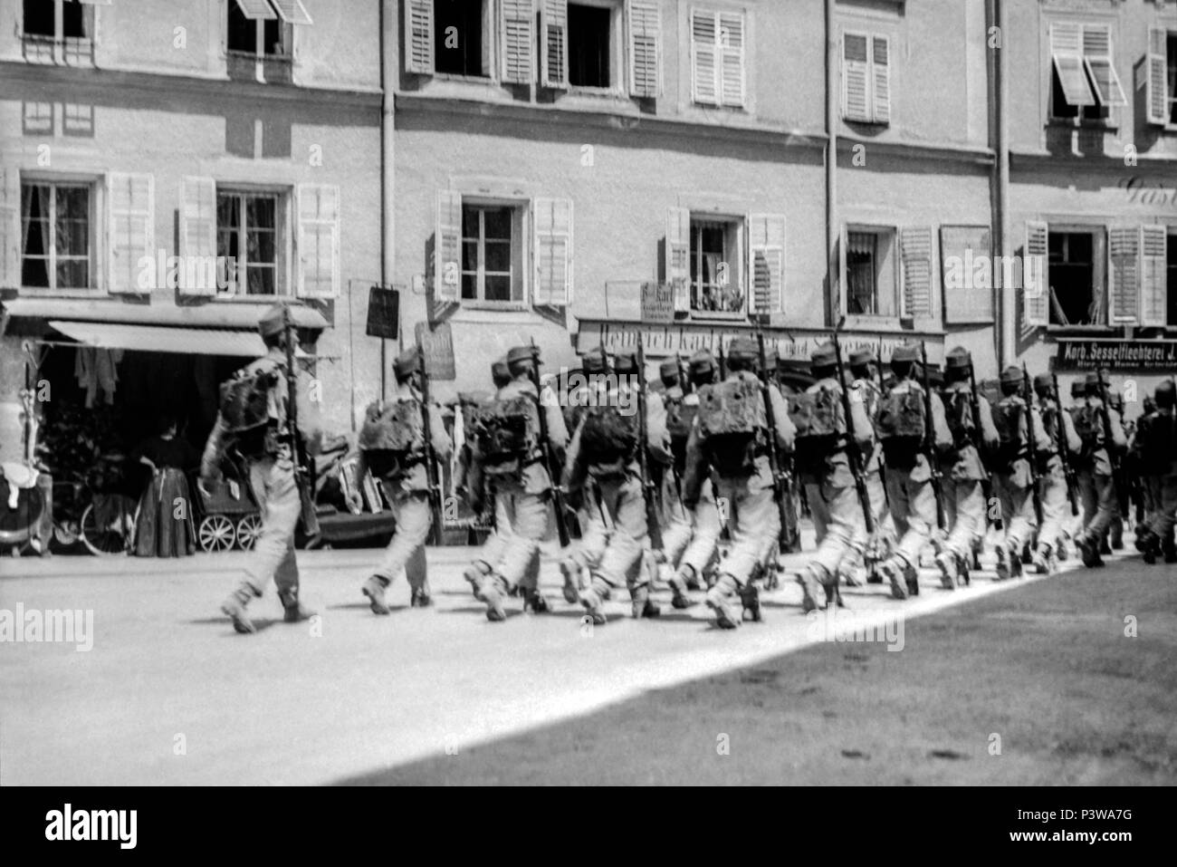 WWI Saltzburg Troops in the street by Rawlinson. Please note that due to the age of the image their might be imperfections showing. Stock Photo