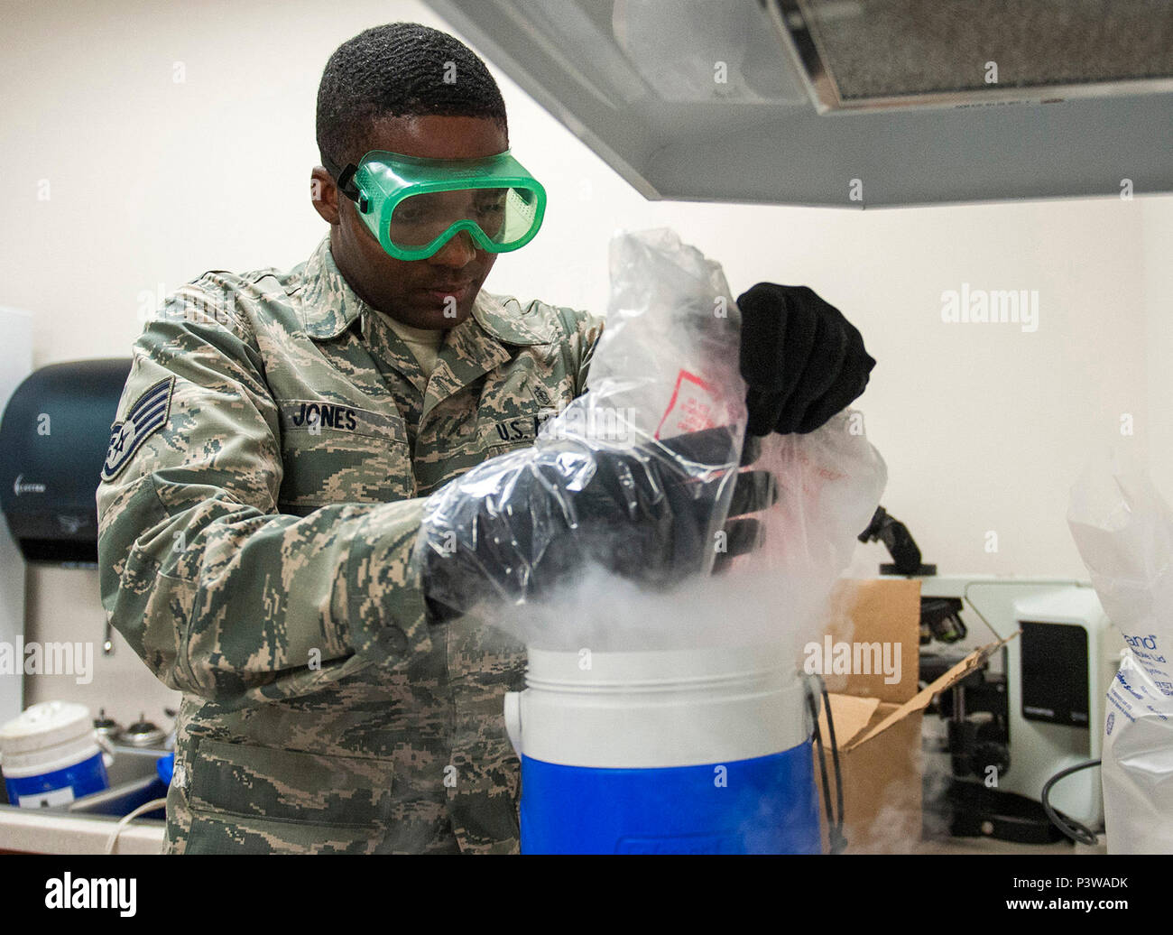 Staff Sgt. Derrick Jones, 96th Aerospace Medicine Squadron public health technician, drops dry