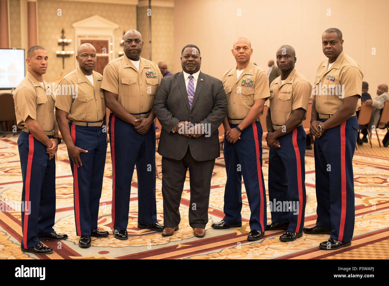 Marines pose with the Antonio F. Knox Sr. 40th Grand Basileus of