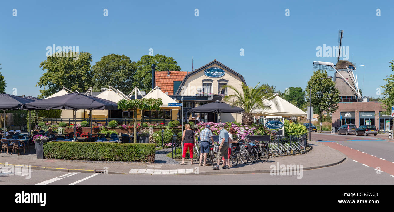 Outdoor cafe with the windmill called The Cow Stock Photo