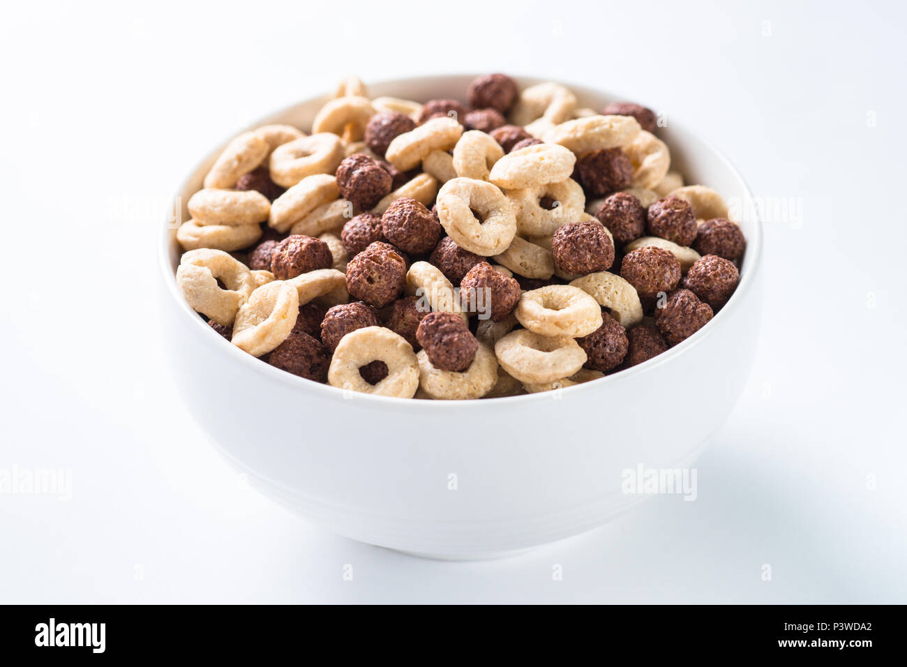 Chocolate pillows in white bowl. Close up. Healthy cereal breakfast Stock Photo Alamy