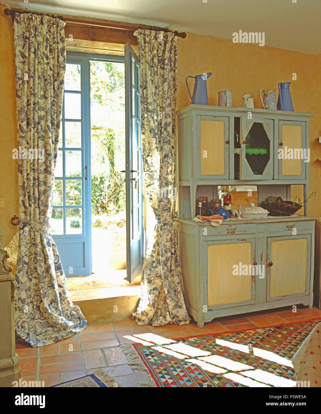 Blue White Floral Curtains On Blue French Windows In Country