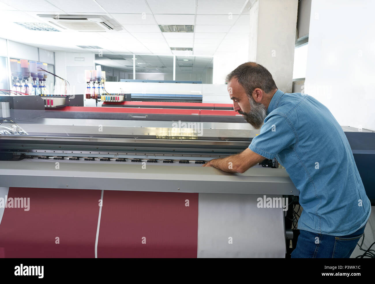 Plotter printing wide format large banner hi-res stock photography and ...