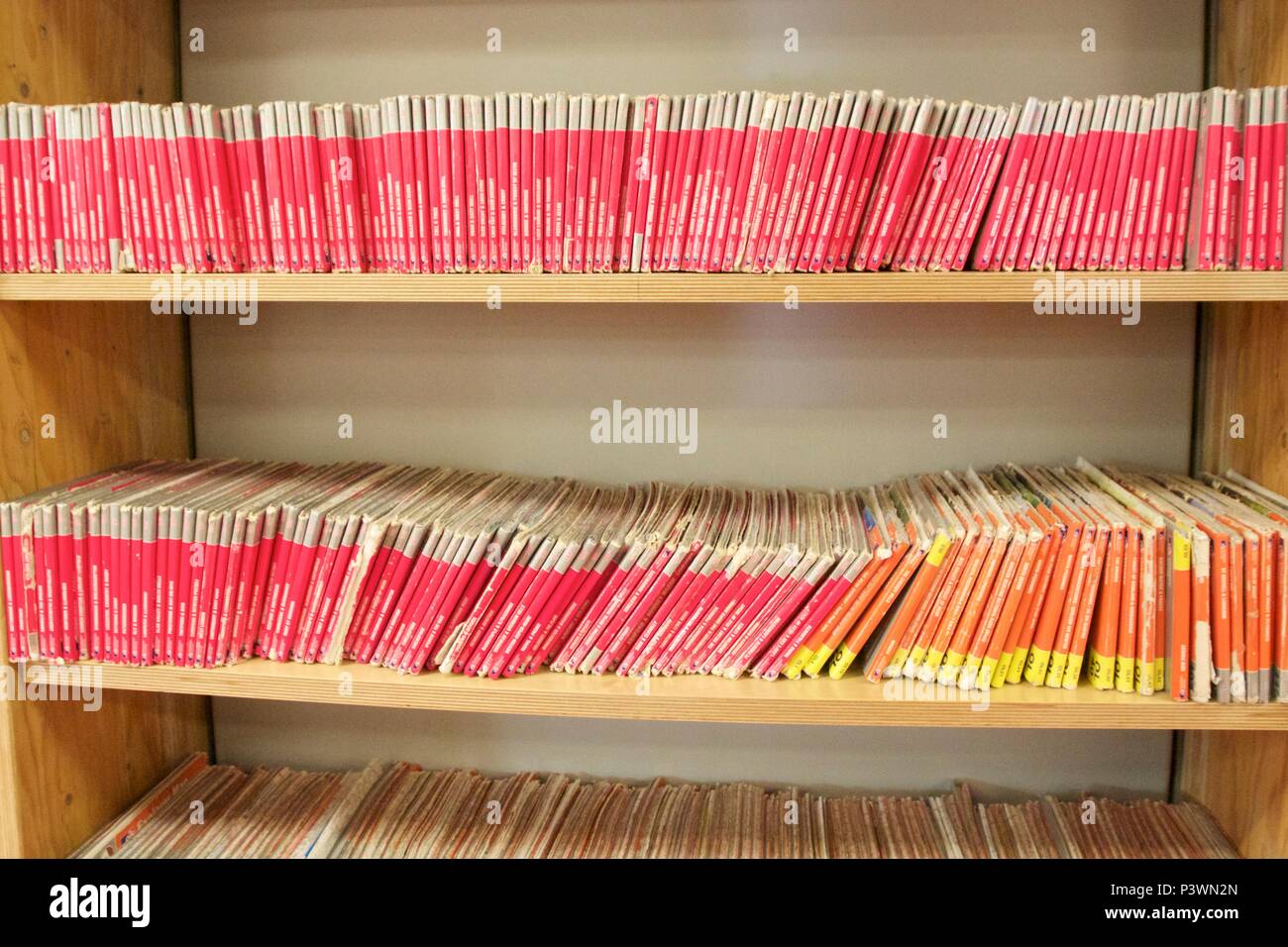 Rows of pink and orange British ordnance maps Stock Photo