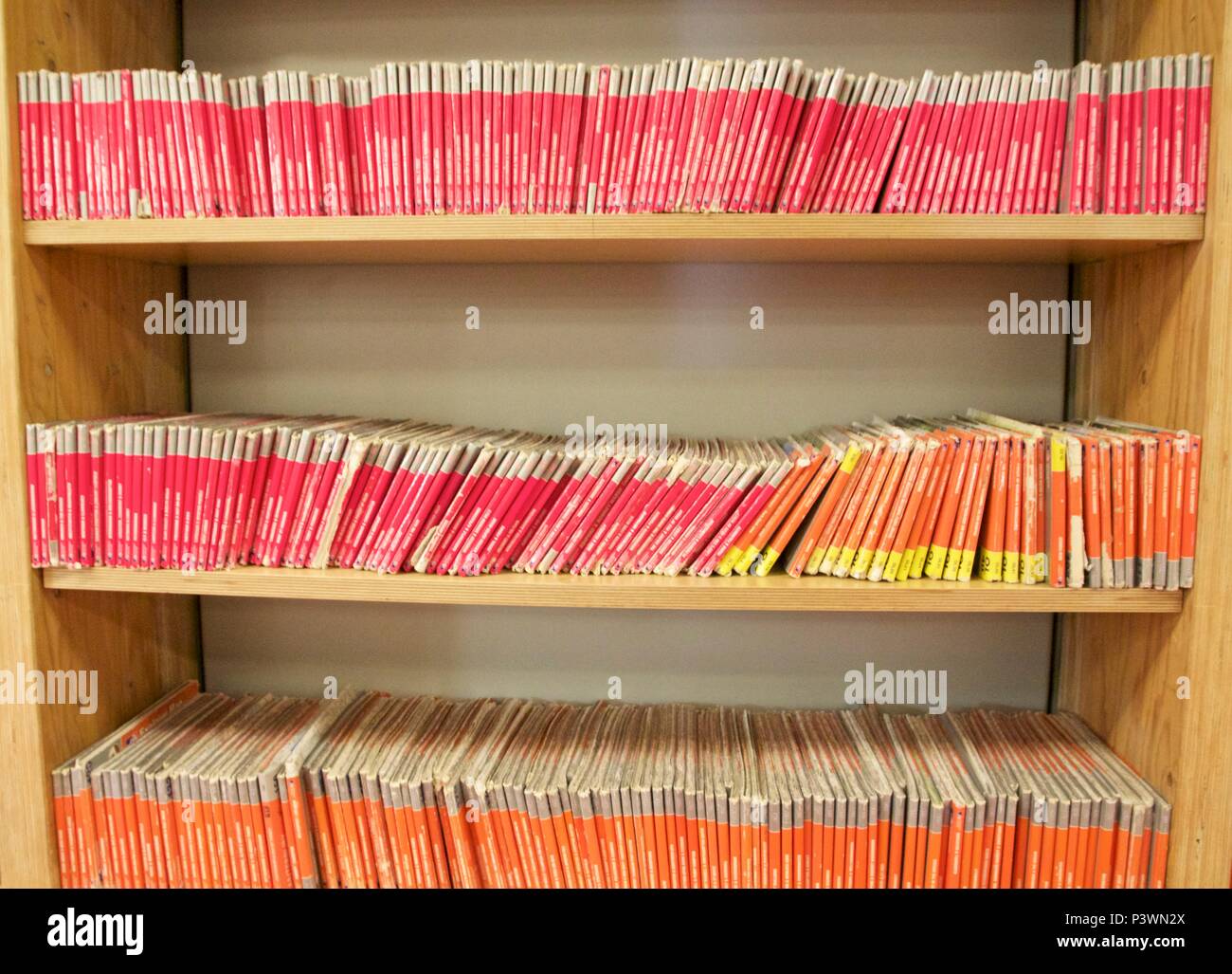 Rows of pink and orange British ordnance maps Stock Photo