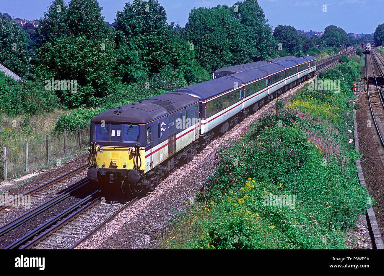 A class 73 electro diesel locomotive number 73210 working a down Gatwick  Express service at Stoats Nest Junction, Coulsdon on the 14th August 2002  Stock Photo - Alamy