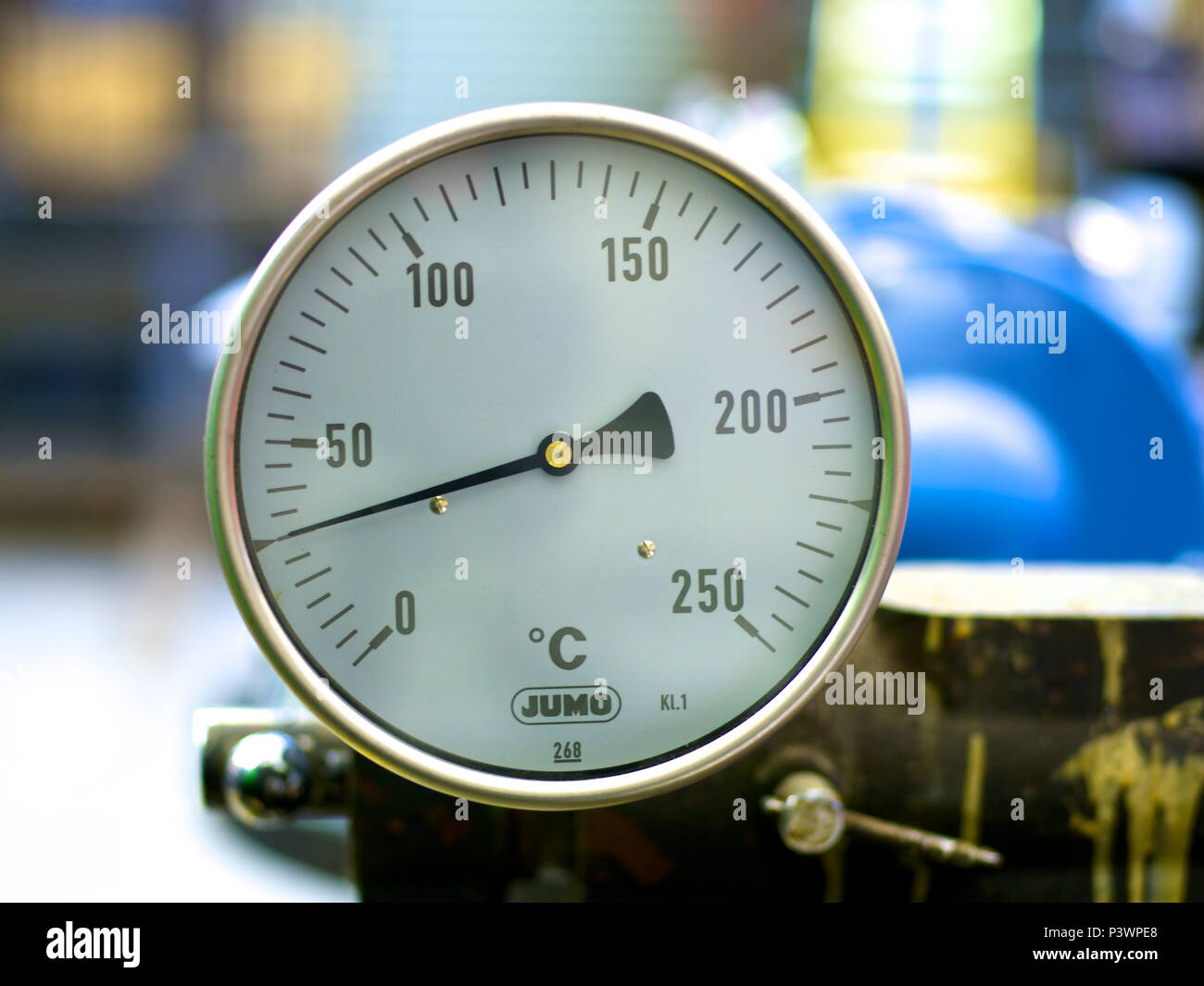 A 0 250 ºC temperature gauge attached to an industrial gas boiler