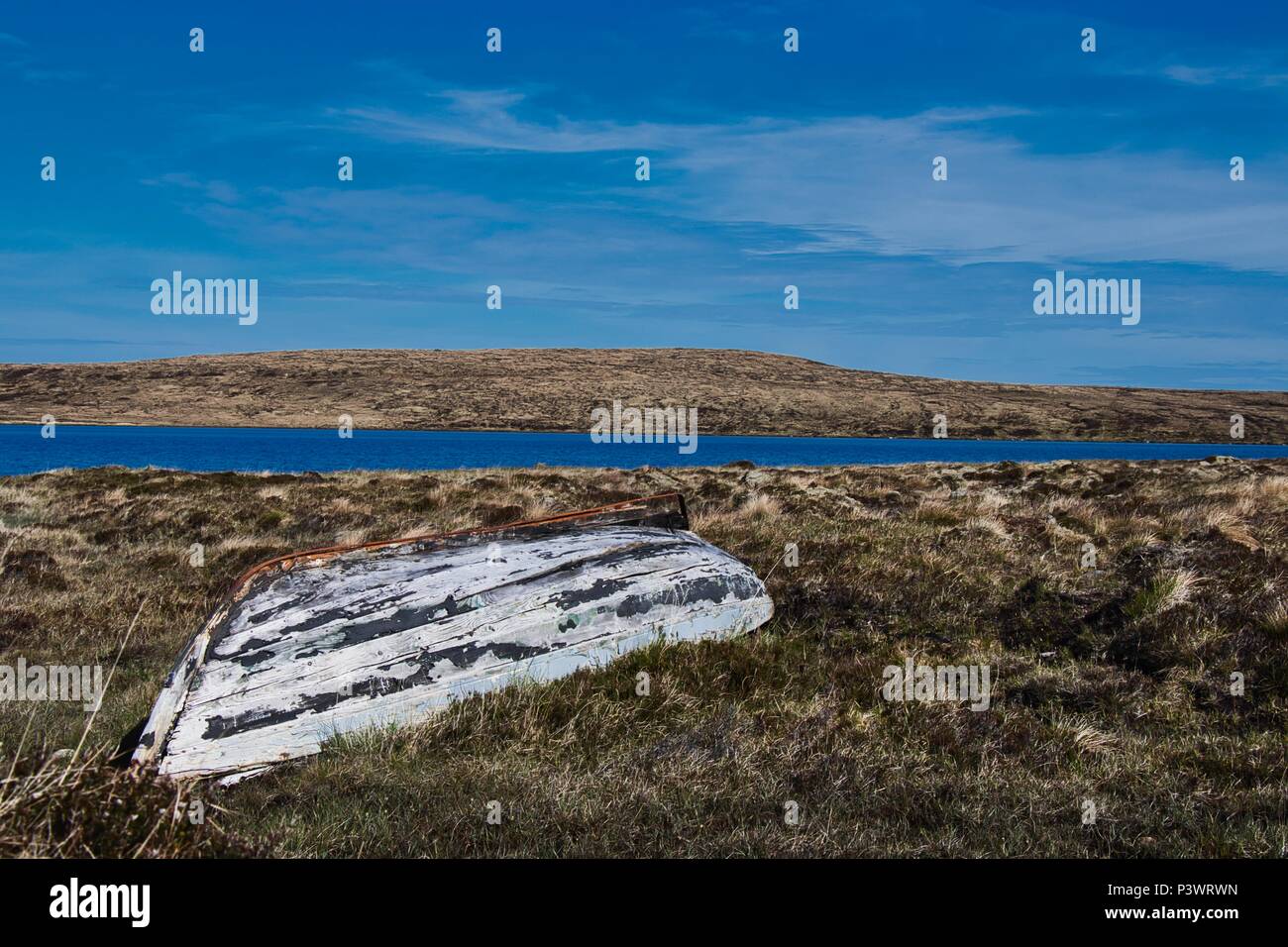 An abandoned rowing boat near Kearvaig, Scottish Highlands Stock Photo
