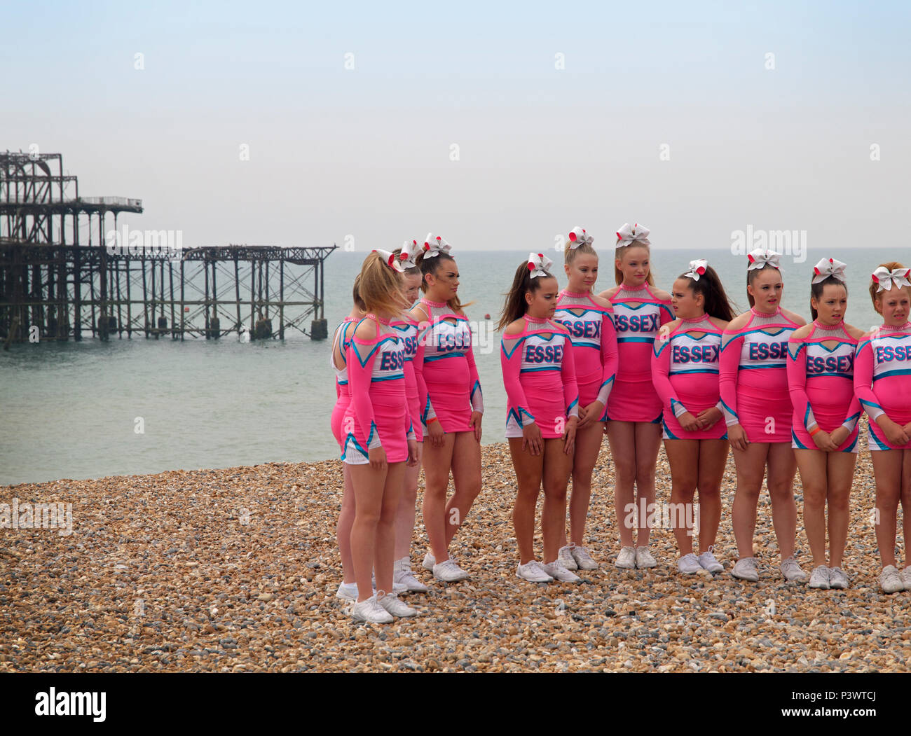 A team of young female gymnasts on the beach at Brighton Stock Photo