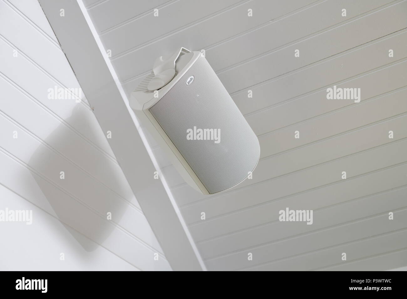 Polk outdoor audio speakers for music and sound in the elements on a porch Stock Photo