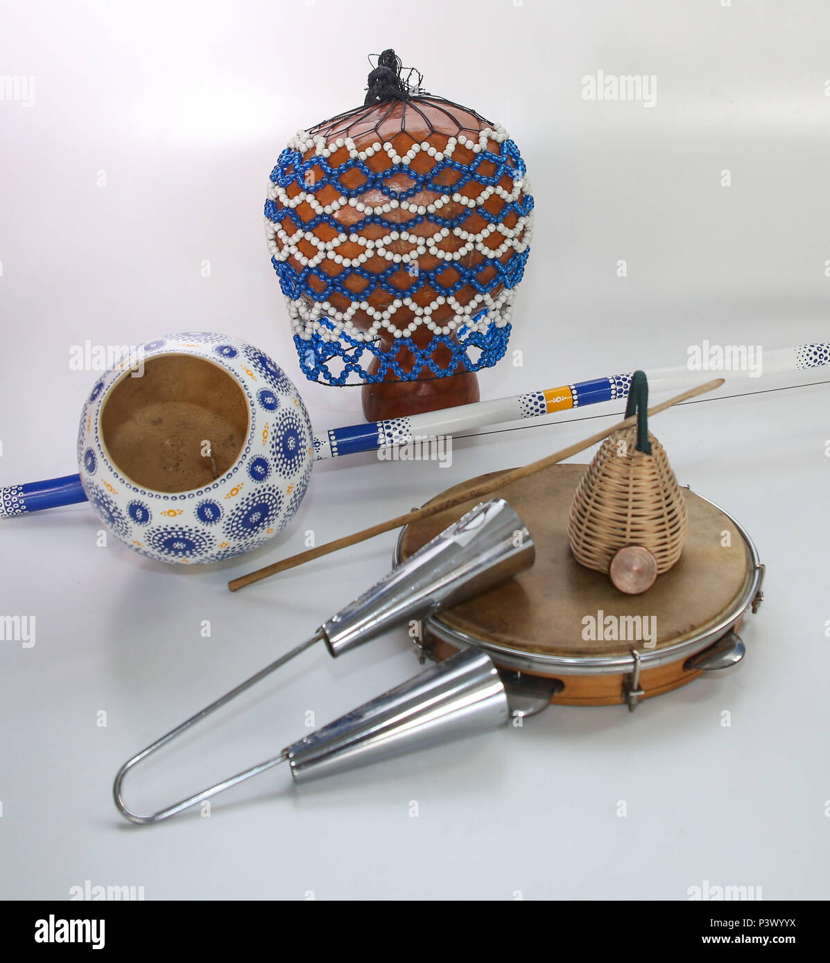 Na foto, xequerê, berimbau, agogô, pandeiro e caxixi. Instrumentos musicais utilizados no acompanhamento da capoeira. Stock Photo