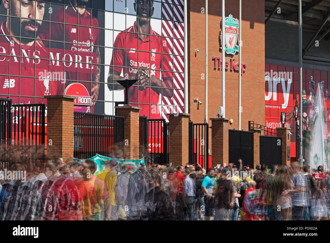 Multiple exposure image of football fans outside Anfield Liverpool for the friendly game between