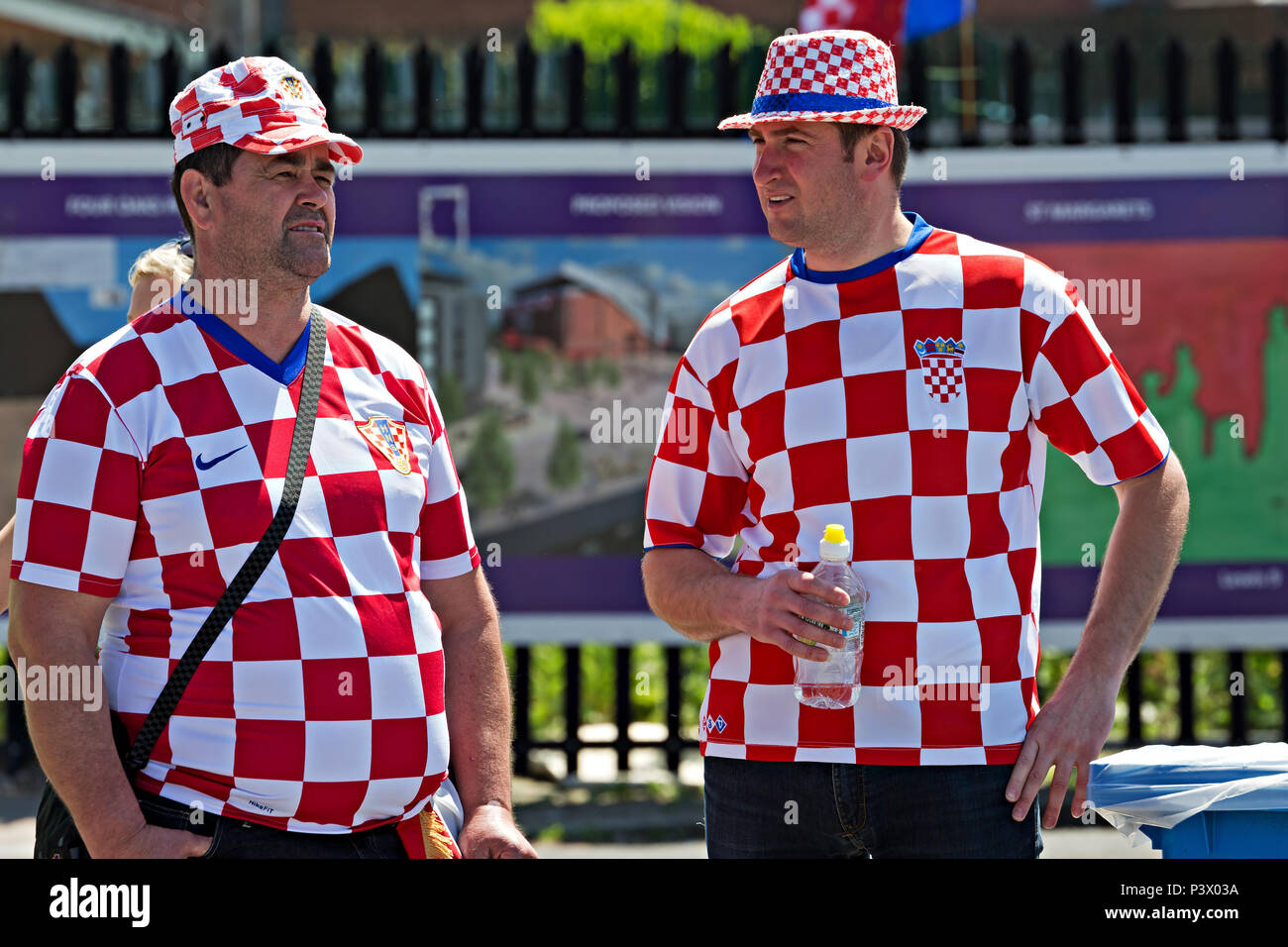 Two Croatian football fans outside Anfield Liverpool before  the friendly game between Brazil and Croatia Stock Photo