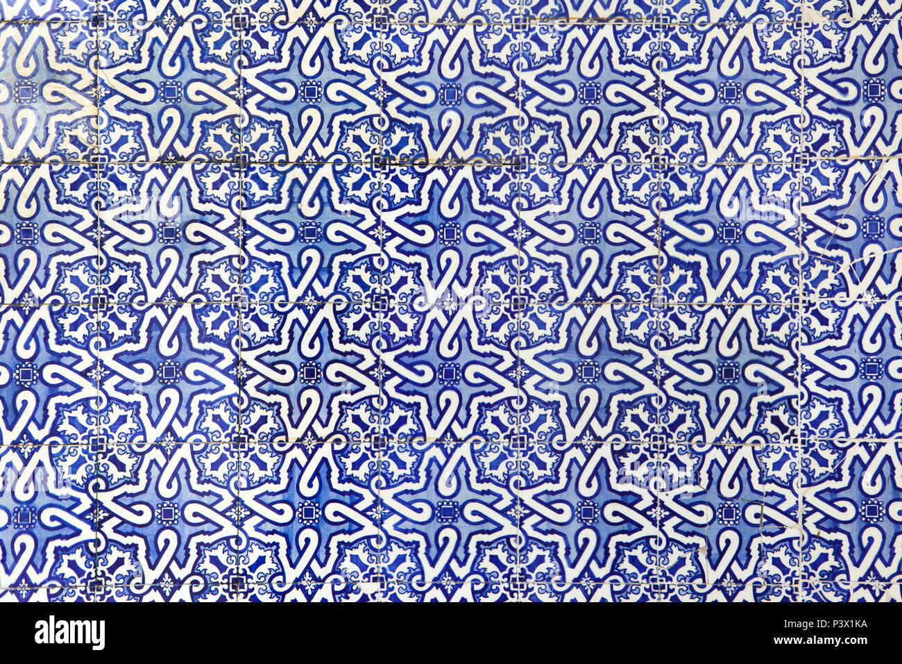 Traditional Portuguese azulejo tiles on the building in Porto, Portugal. Background texture. Stock Photo