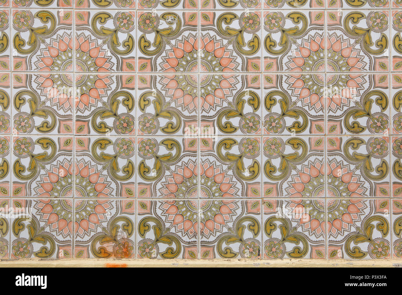 Traditional Portuguese azulejo tiles on the building in Porto, Portugal. Background texture. Stock Photo