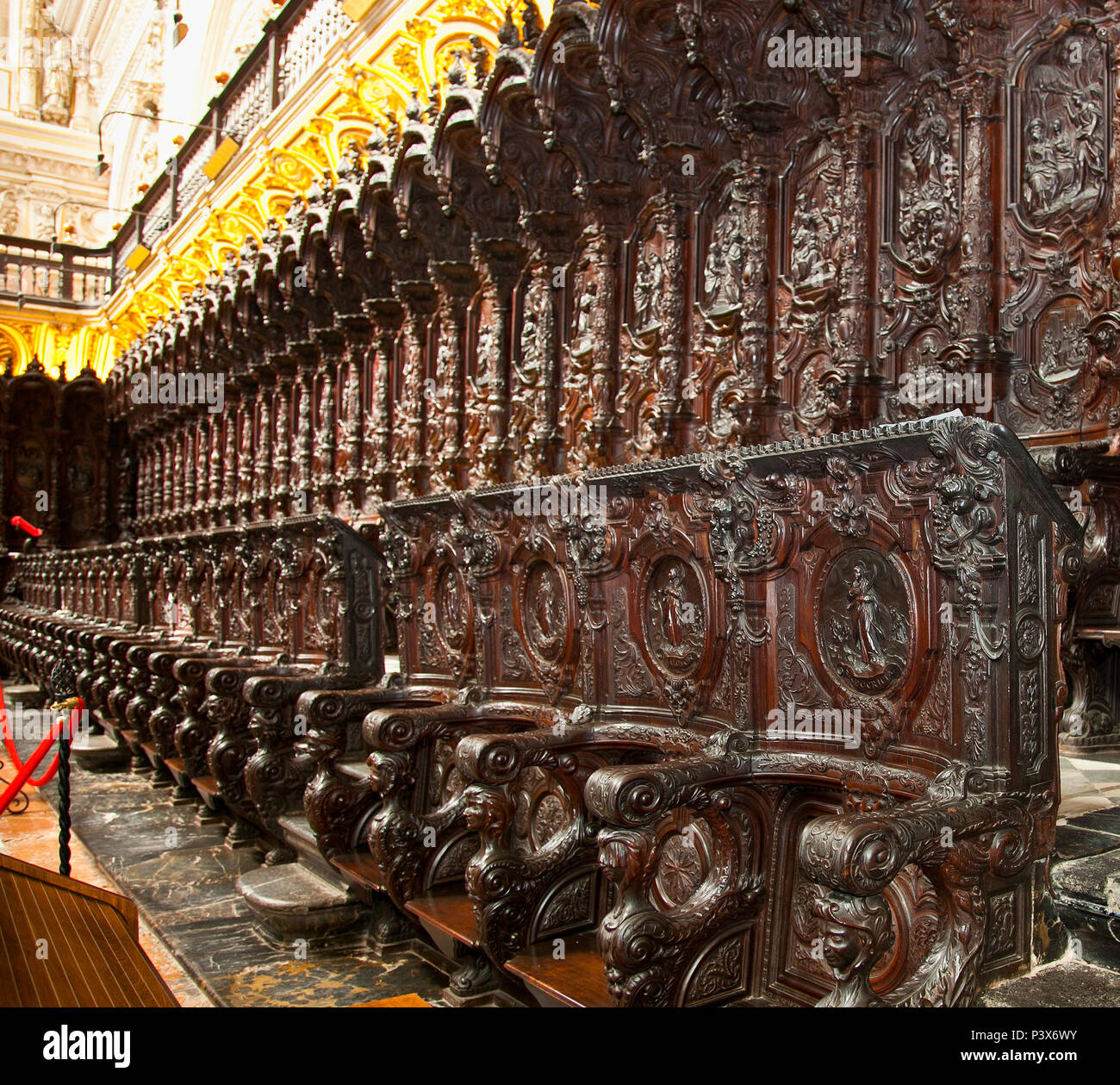 Beautiful choir medieval wood carving of the Mezquita Catholic cathedral in Cordoba, Spain. Stock Photo