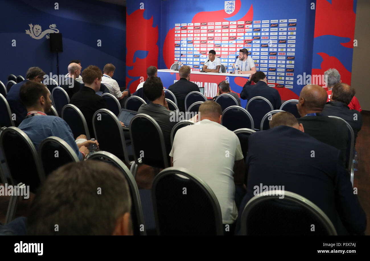 England's Marcus Rashford (left) and Senior Communications manager Andy Walker during the media access at Repino Cronwell Park, Repino. Stock Photo
