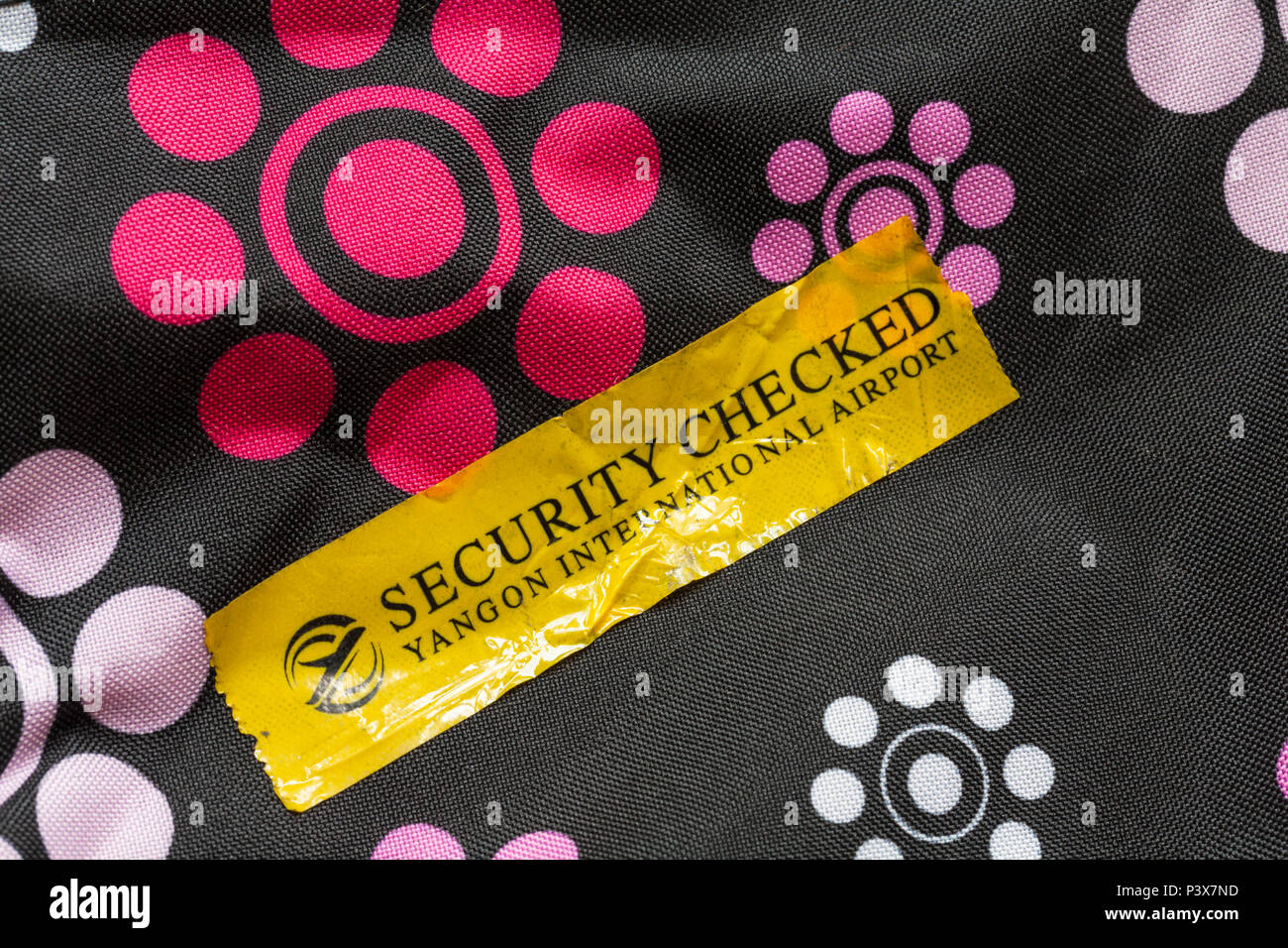 Security checked sticker on bag hi-res stock photography and images - Alamy