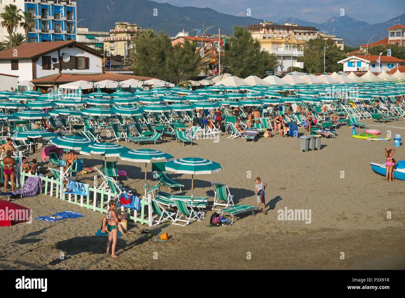 a crowded beach in Marina di Massa, Versilia, Tuscany, Italy Stock Photo