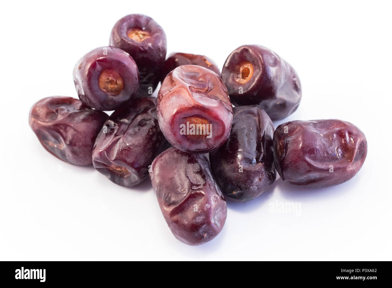 Ripe Dates Fruit Isolated on White. Stock Photo