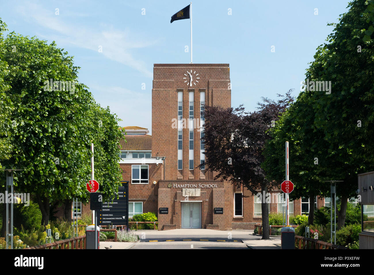 Front exterior facade of Hampton School with flag flying. It is an independent day school for boys in Hampton, London. UK (99) Stock Photo