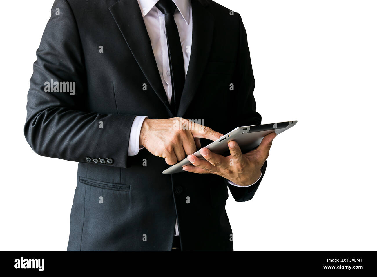 Men wearing a black suit, look credible, a businessman, wearing a white shirt, a black tie, a mobile tablet is working. Stock Photo