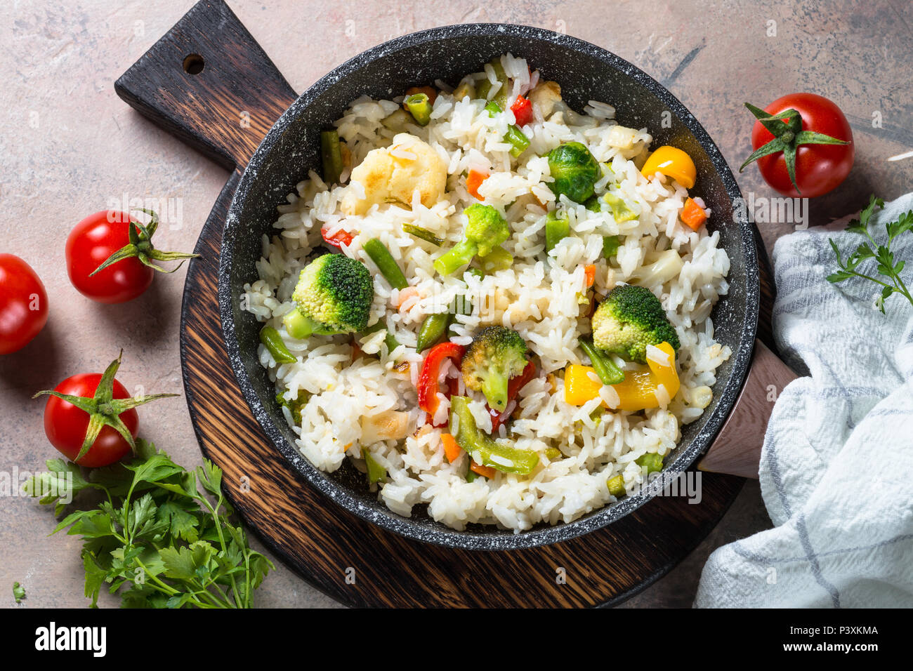 Vegetable risotto. Rice with broccoli, cauliflower, sweet pepper and