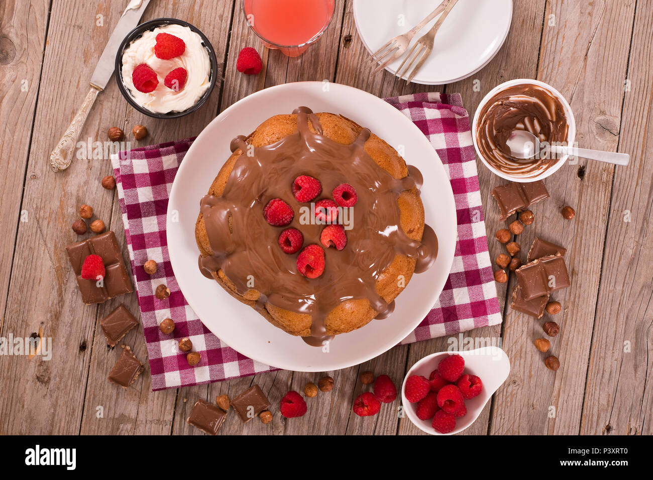 Chocolate cake with raspberries Stock Photo - Alamy
