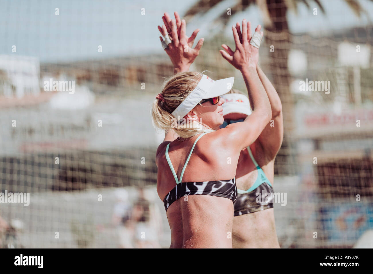 Beach Volley team, Maggie Kozuch, and Karla Borger, celebrate a point during a friendly match Stock Photo