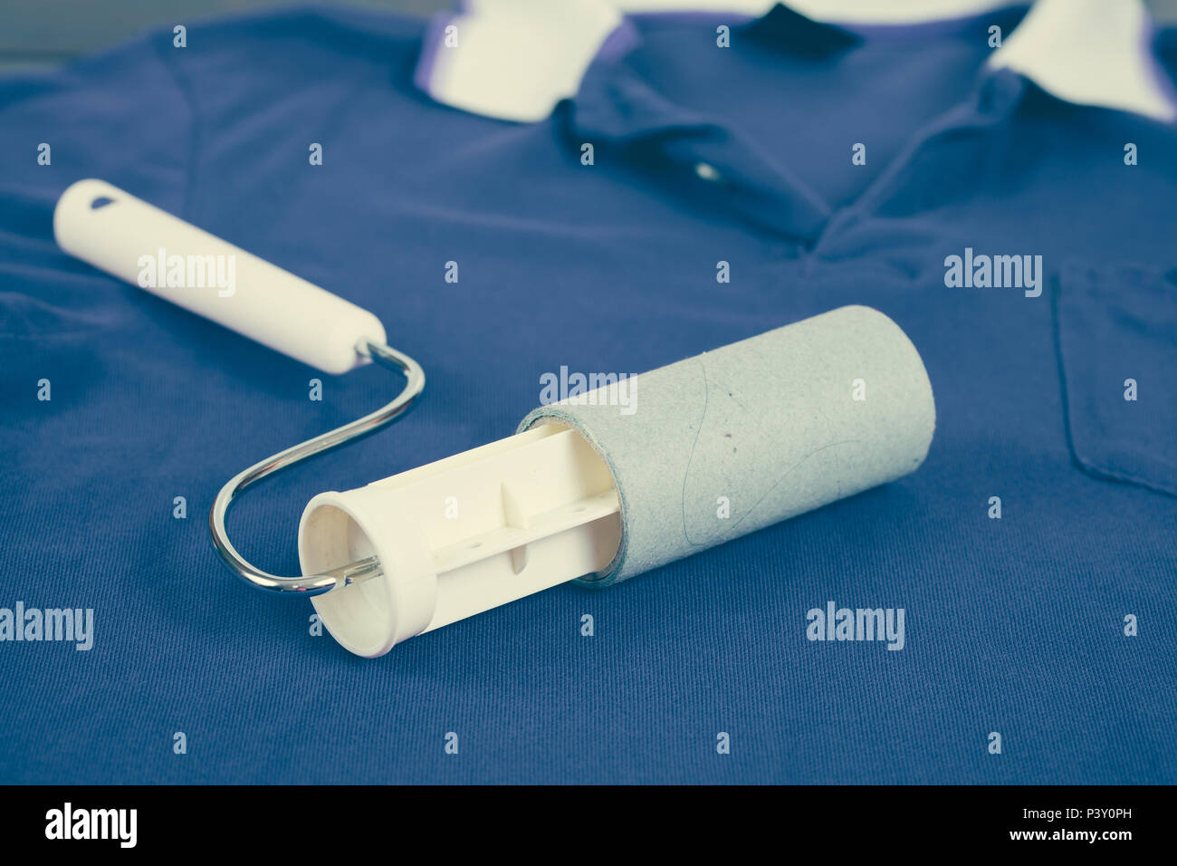 lint roller adhesive tape full of dust after used to clean the cloth